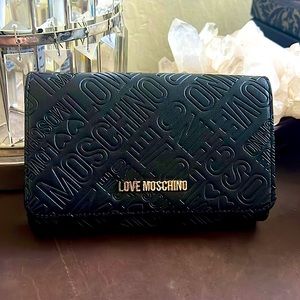 Logo Love Moschino wallet. Leather. Color black. Excellent condition.